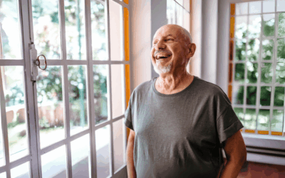 Candid shot of a senior man looking happy and smiling.